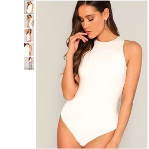 Slim fitted white bodysuit